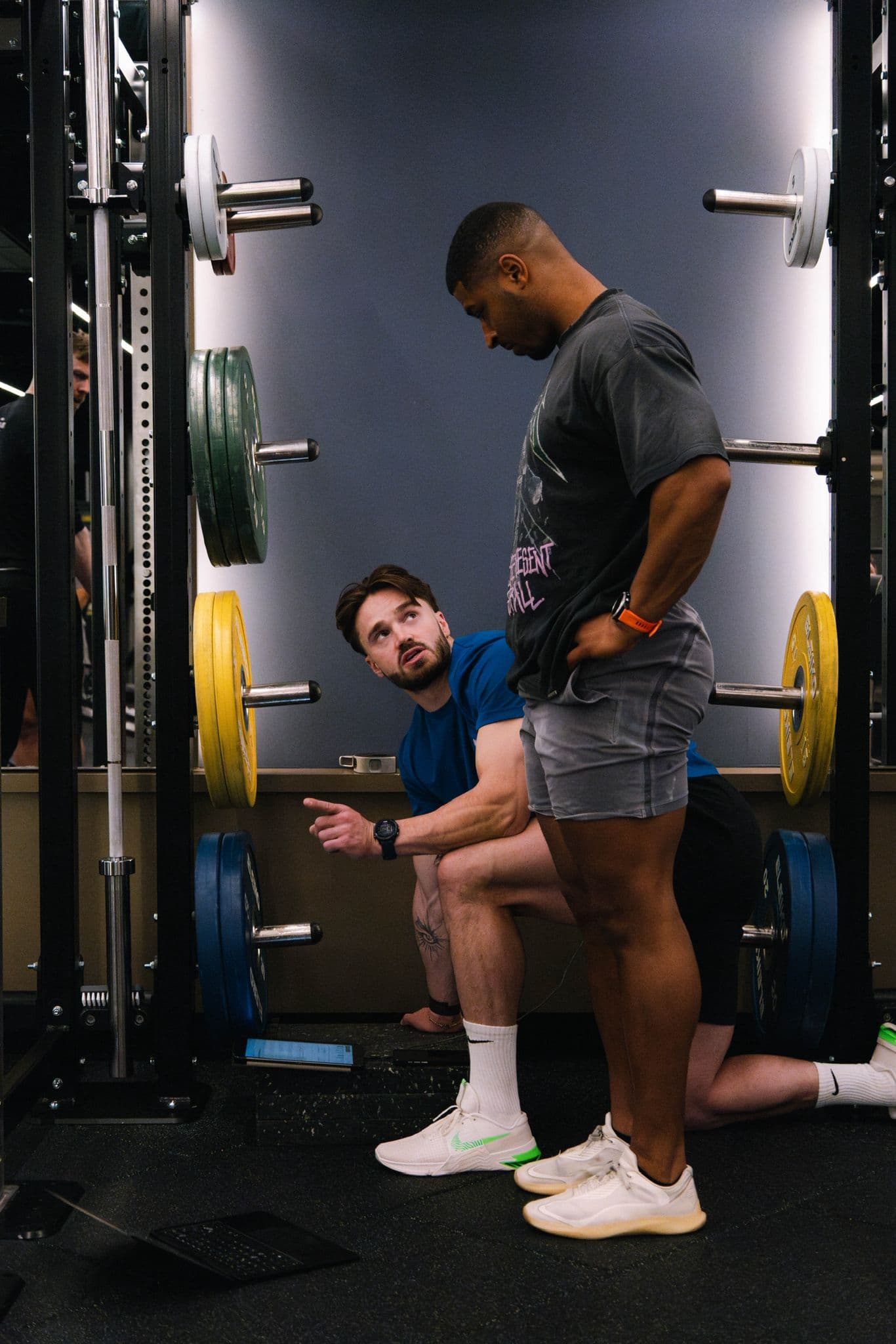Coaching instruction at the squat rack